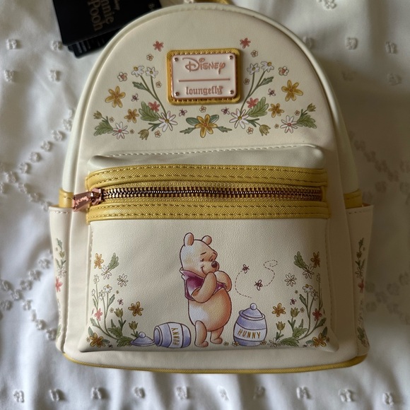 Loungefly Handbags - Loungefly Disney Winnie the Pooh  Cream and Yellow Kids Backpack